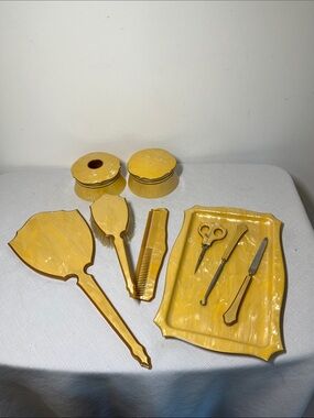 Vintage AUSCO Vanity Set
Yellow Celluloid 
Mirror, Brush, Comb, Tray & Tools